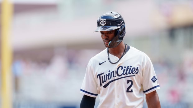 Sep 24, 2023; Minneapolis, Minnesota, USA; Minnesota Twins center fielder Michael A. Taylor (2) walks back to the dugout after grounding out against the Los Angeles Angels at Target Field. Mandatory Credit: Matt Blewett-USA TODAY Sports